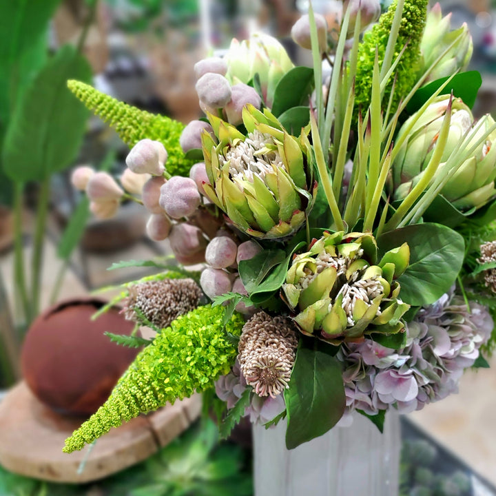 Queen Protea, Eremurus, Banksia, Hydrangea, Fig Stems and Grass in Ceramic FD: 32"H