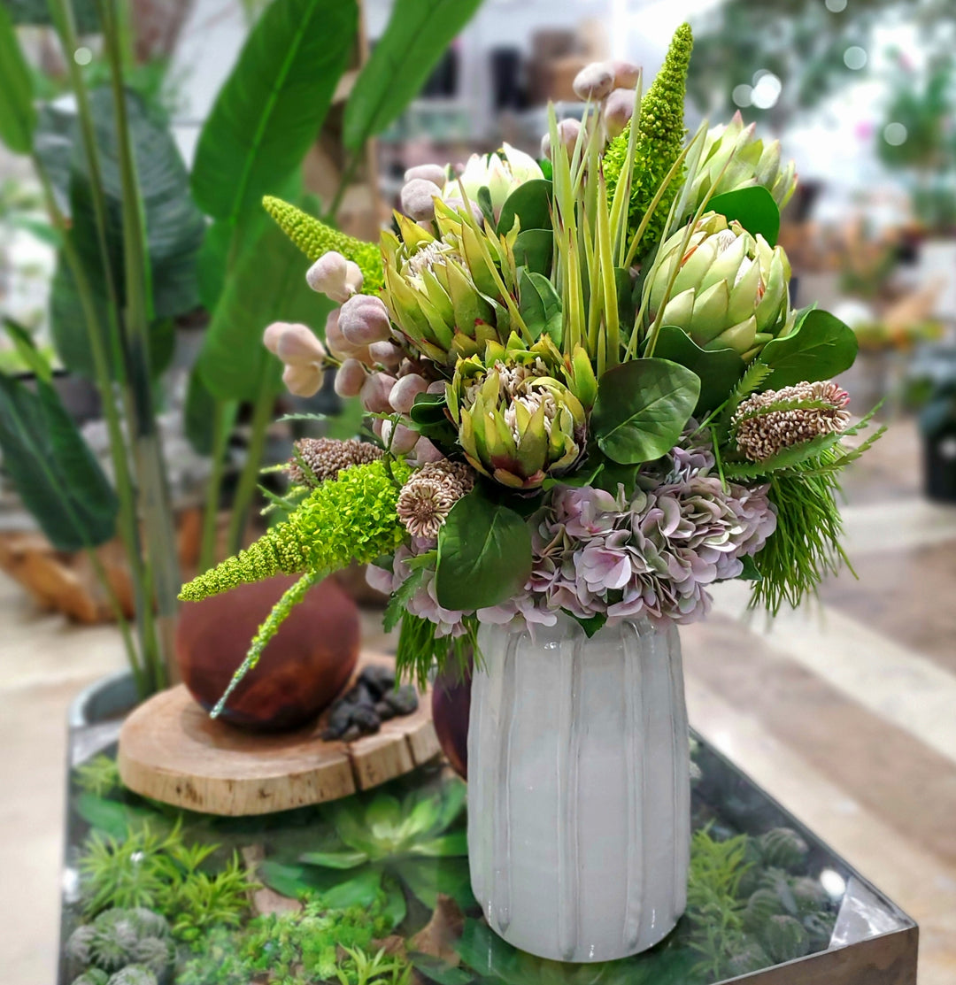 Queen Protea, Eremurus, Banksia, Hydrangea, Fig Stems and Grass in Ceramic FD: 32"H