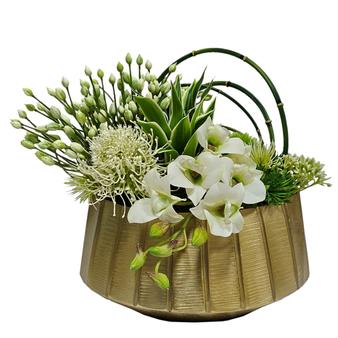 White Agapanthus, Protea, Horsetail Reeds and Dendrobium Orchid in Gold Metal Oval  11"H