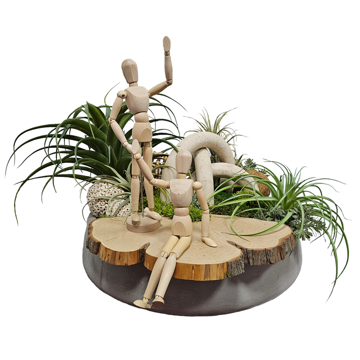 Marble Arches with Tillandsia, Natural Fiber Spheres with Wood Slice and Posable People in Concrete Bowl  20"H