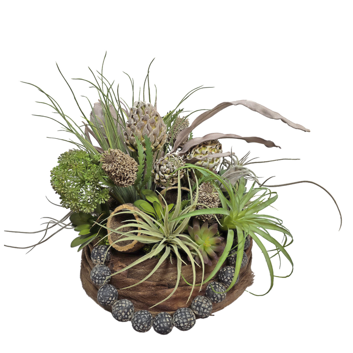 Clay Beads, Tillandsia, Foam Artichokes, Dried Coconut Shell in Natural Fiber Round Container. 20"H