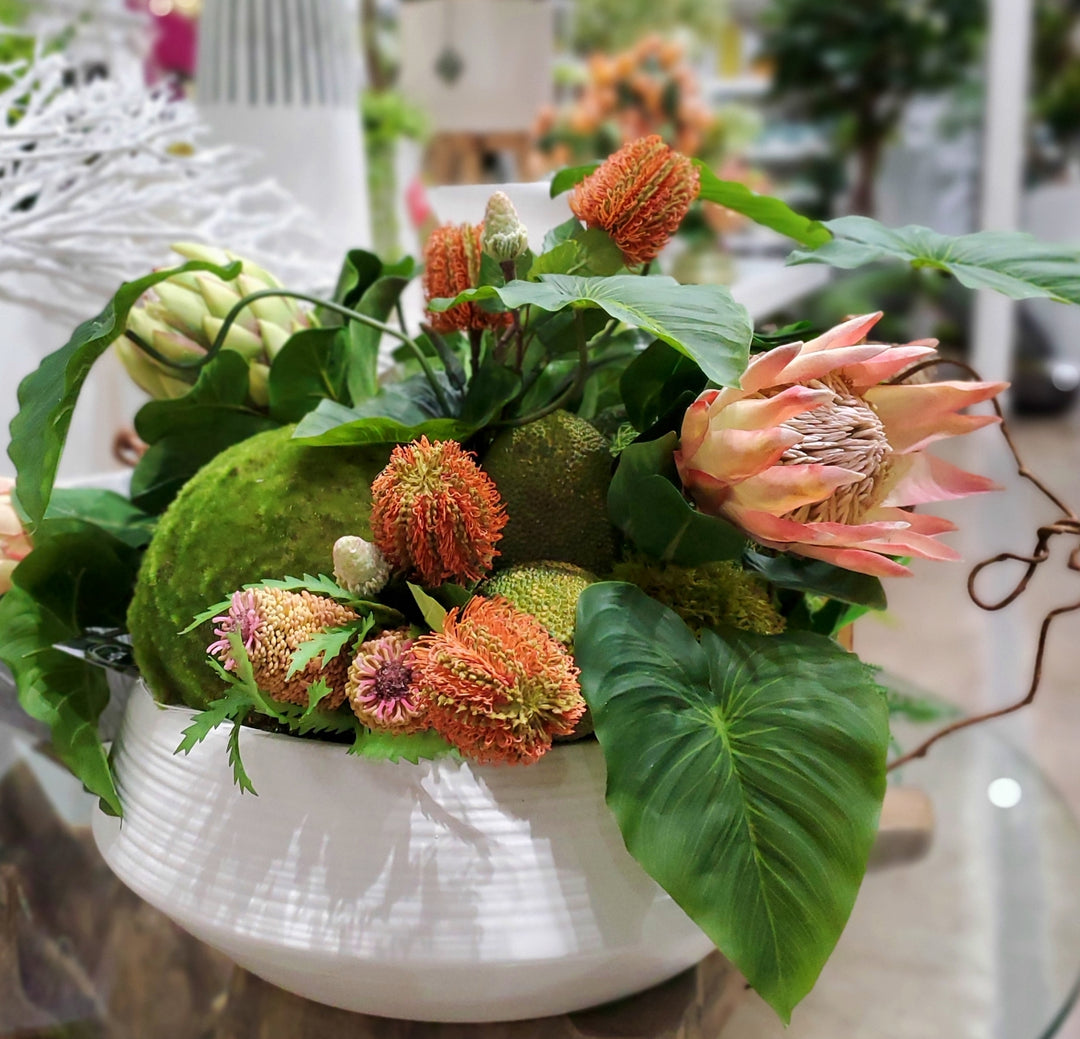 King Protea, Banksia, Druid Fruit, Moss Spheres and Anthurium Leaves in Ceramic 20"H