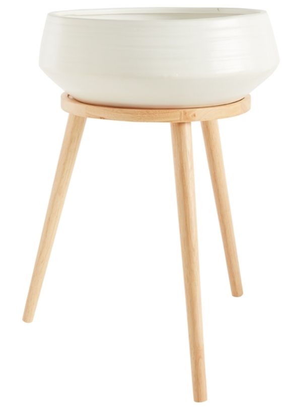 White Ceramic Bowl on Wood Stand